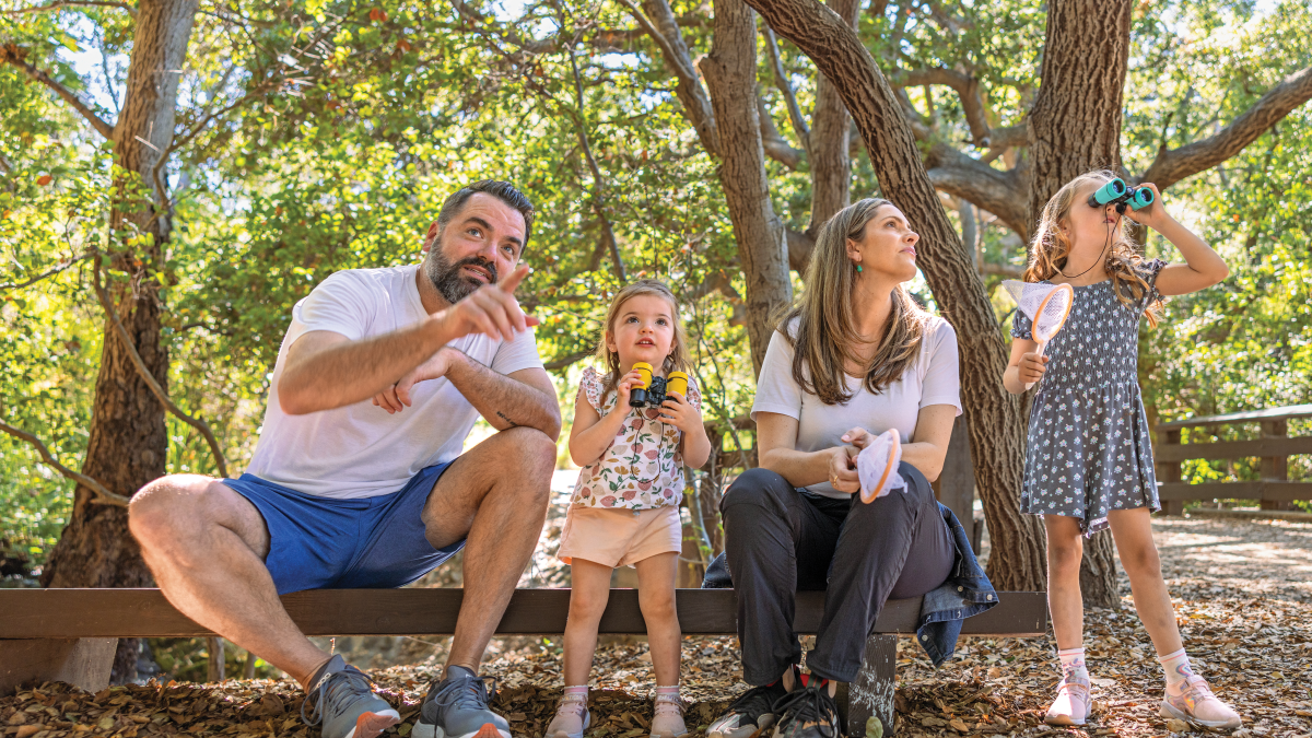 Family enjoying a day at a nearby wooded area